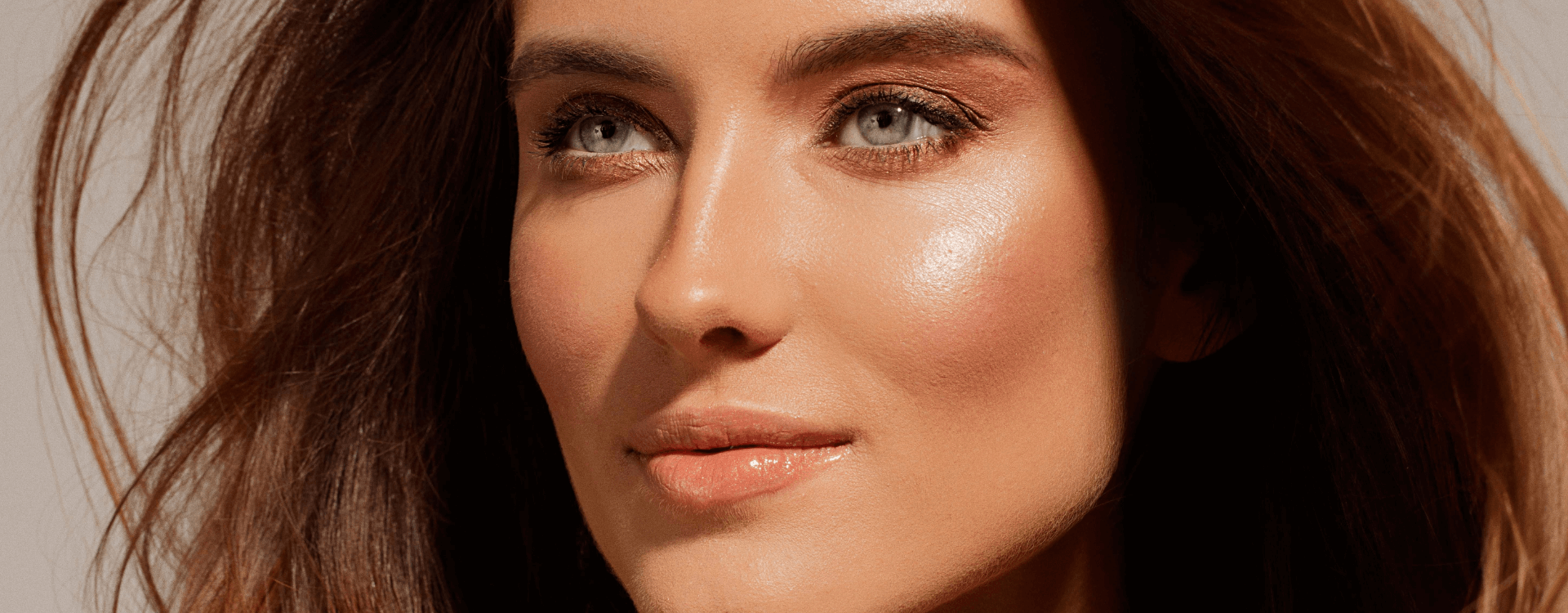 Smooth, glowing skin on a woman's cheek