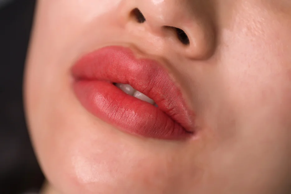 a woman with fuller, plump lips